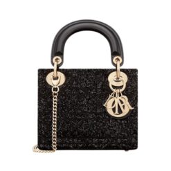 Cotone ricamato con microperline nere e motivo Cannage