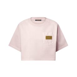 Top corto con tasca iconica