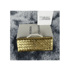 Andiamo Clutch Oro Manico